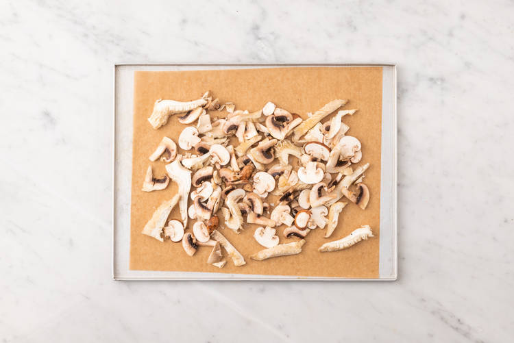 Roast mushrooms and cook bacon