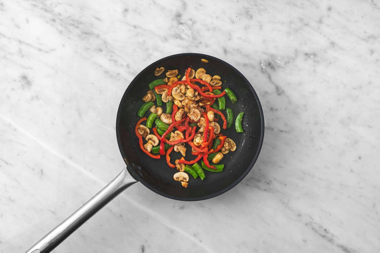 Cook veggies and shrimp