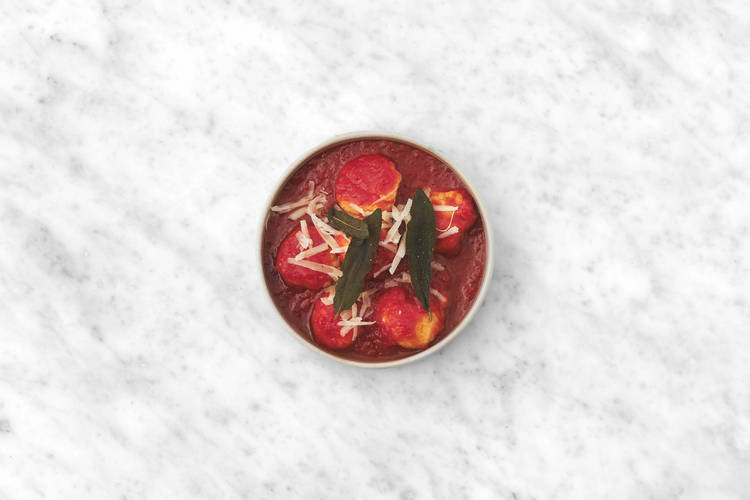 Make tomato-garlic sauce and serve