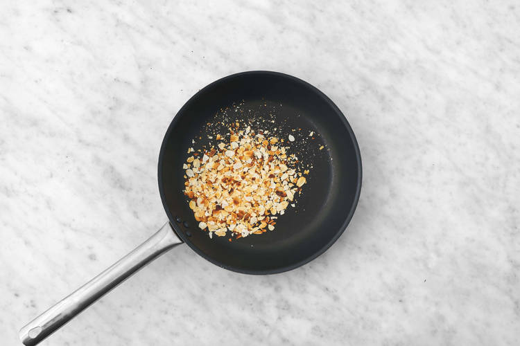 Whip cream and toast almonds