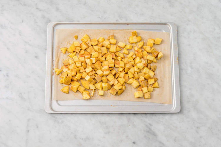 Bag kartofler og pastinak