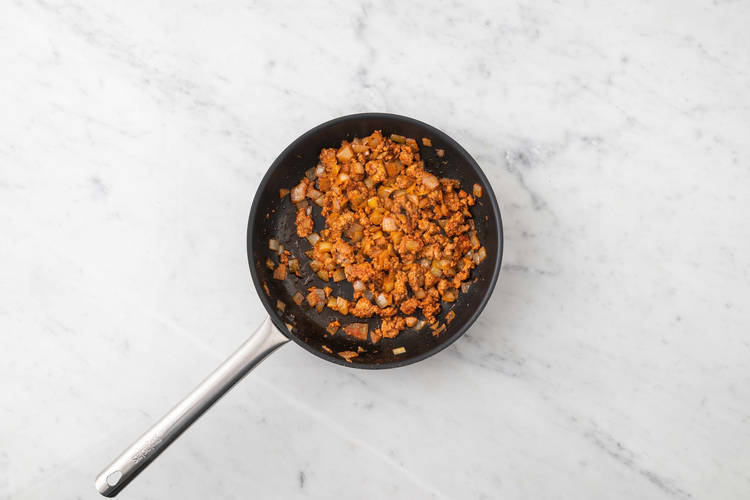 Cook onions and Beyond Meat®