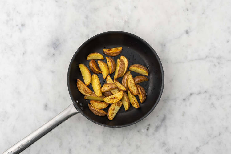 Fry the potatoes