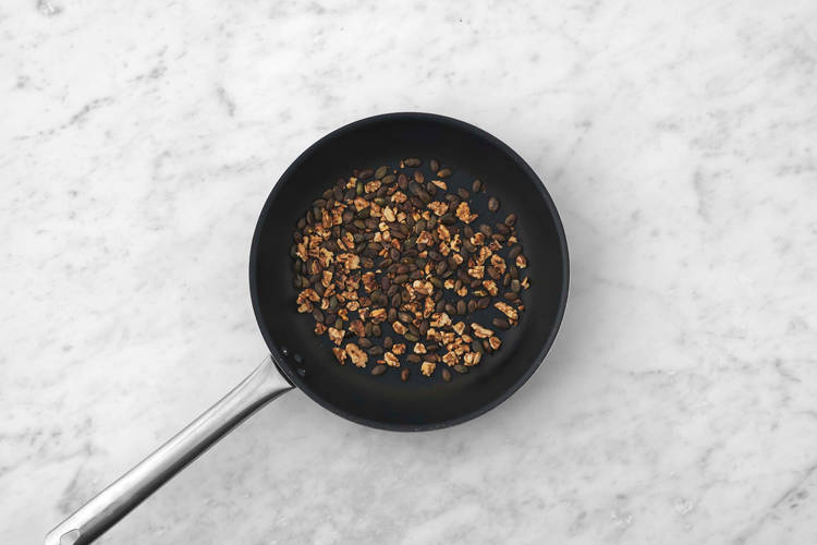 Toast walnuts and pepitas