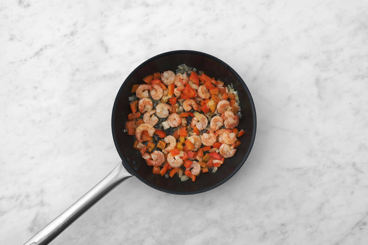 Cook shrimp and veggies