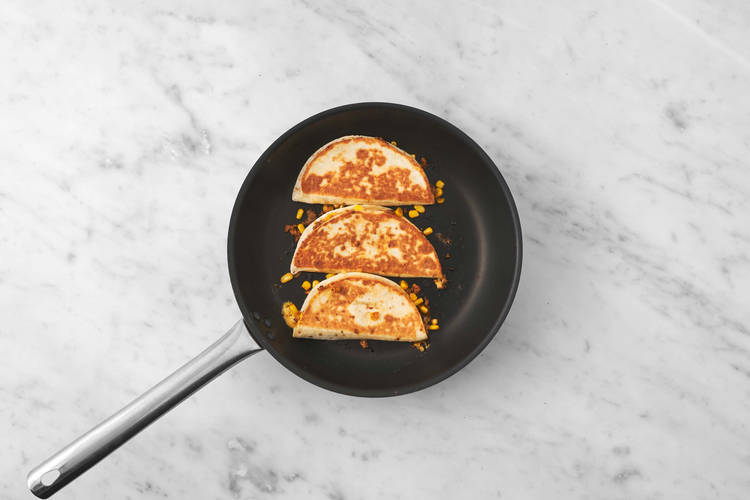 Assemble and cook quesadillas