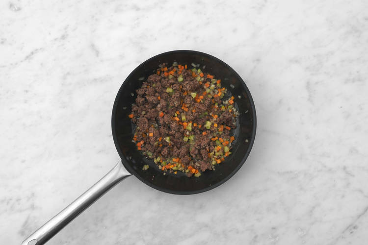 Cook veggies and sausage