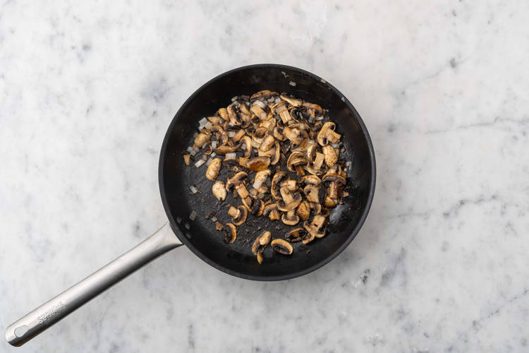 Sauté mushrooms and sausage 