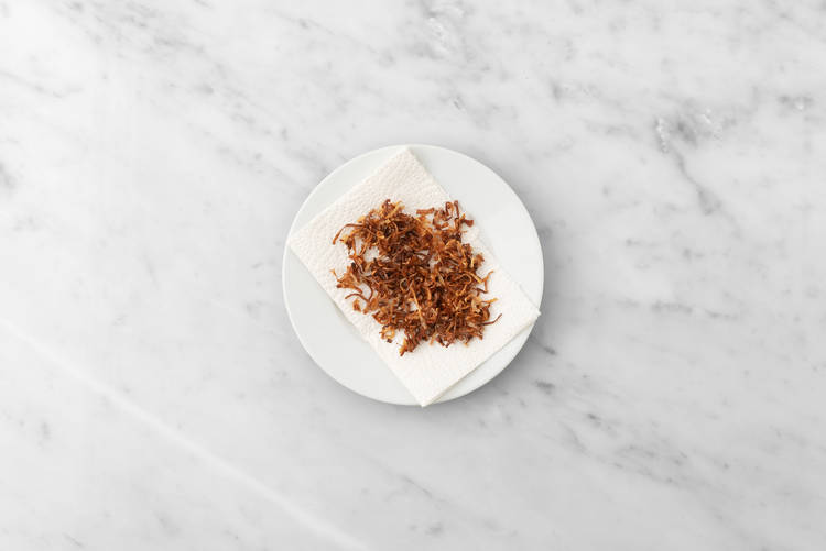 Commencer les échalotes frites