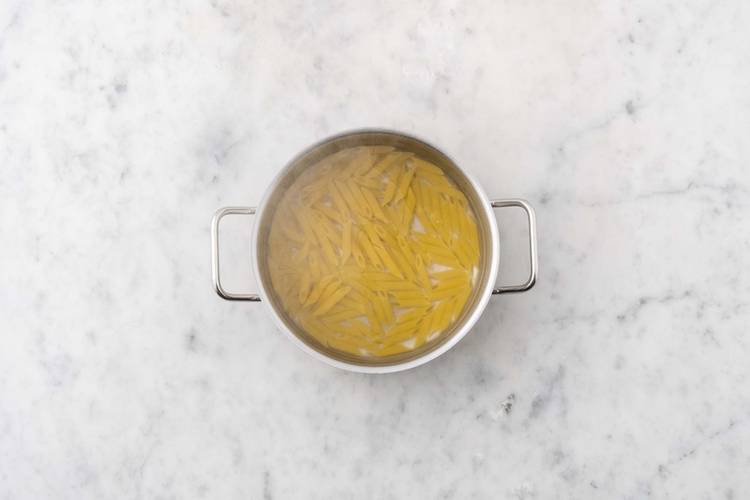 Cook penne and prep chips