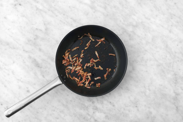 Cook bacon and onions