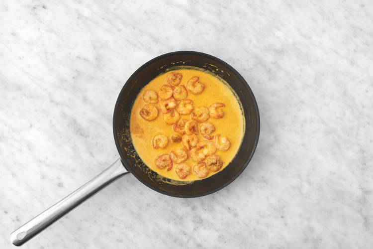 Cook shrimp and make curry