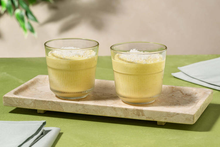 Mangosmoothie met kokosrasp