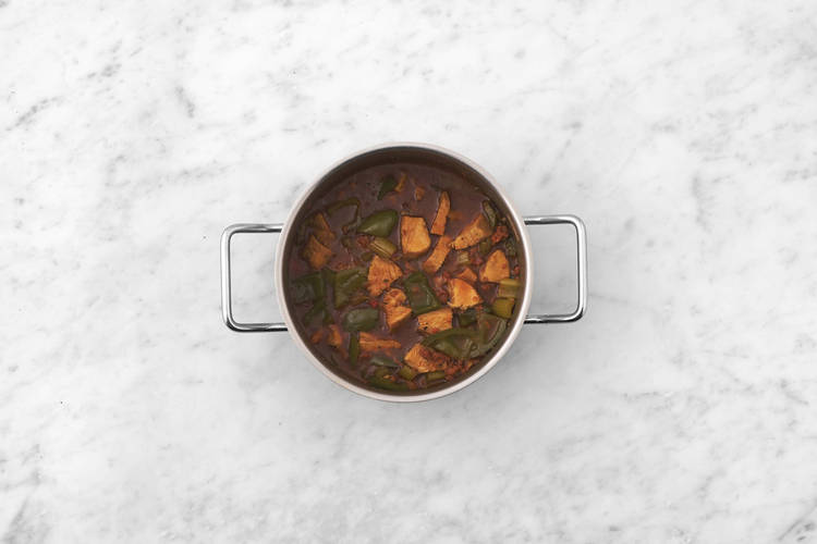 Cook veggies and make gumbo