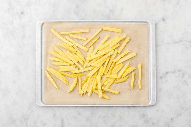 Enfourner les pommes de terre