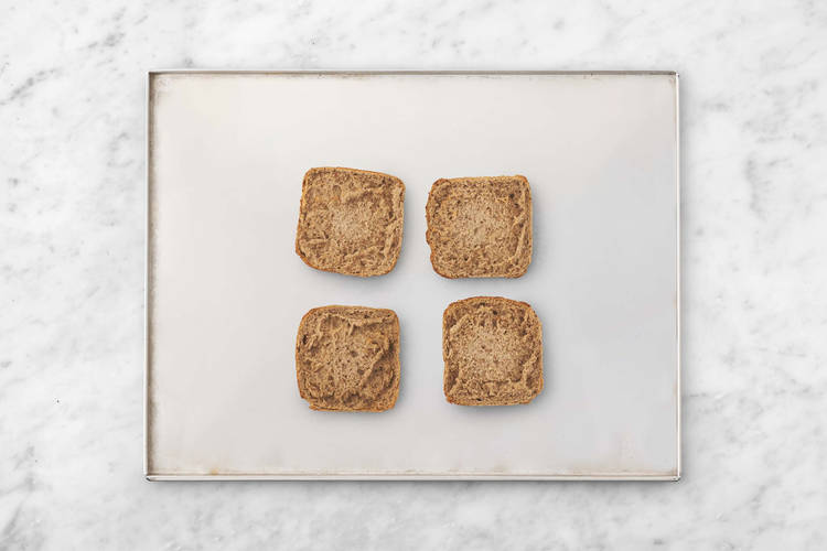 Melt cheese and toast buns