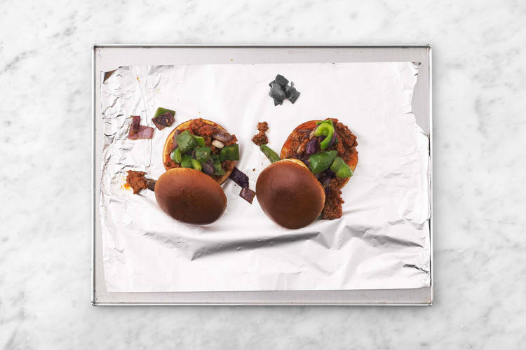 Toast buns and make hoagies