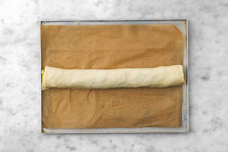 Re-stretch and roll dough
