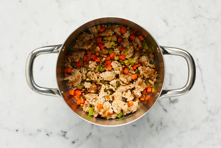 Cook sausage and veggies