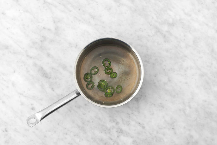 Make candied jalapeños