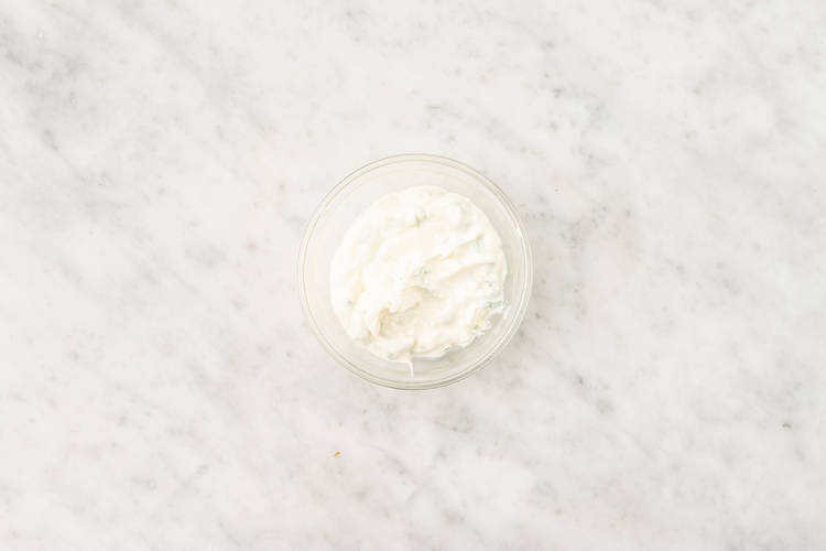 Roast potato coins and make cream cheese spread