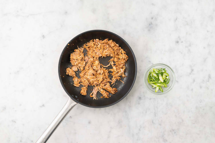 Fry the pulled chicken