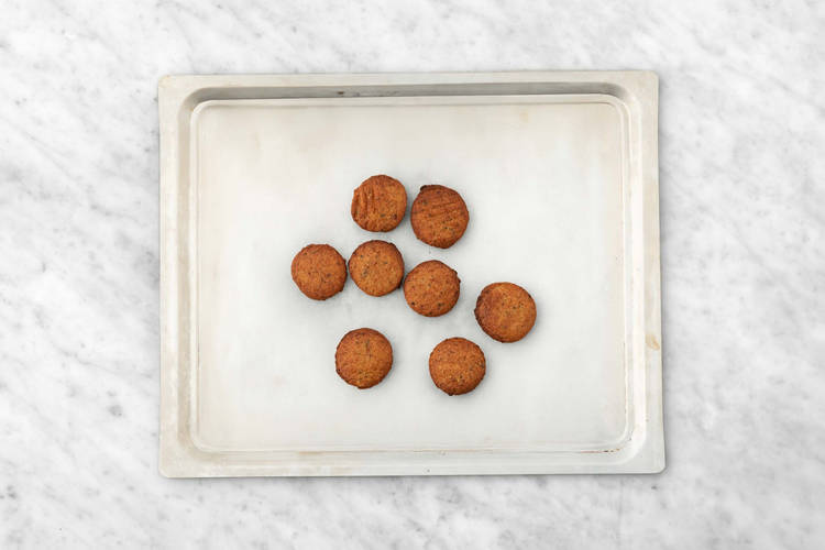 Cook chicken and roast falafel