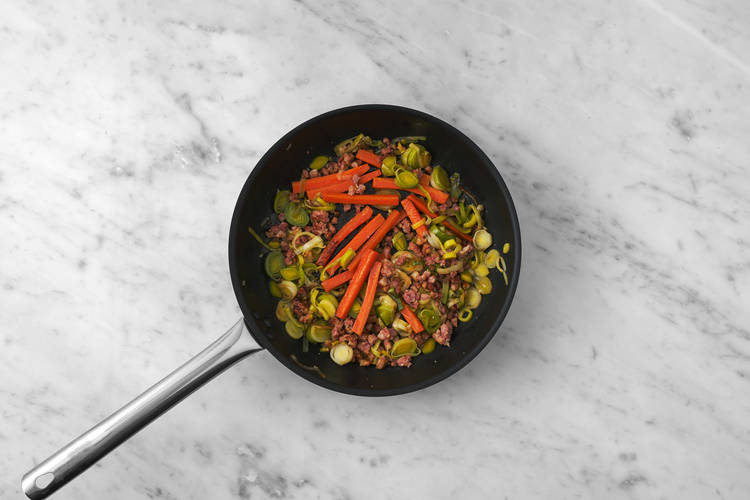 Cuocere verdure e pancetta