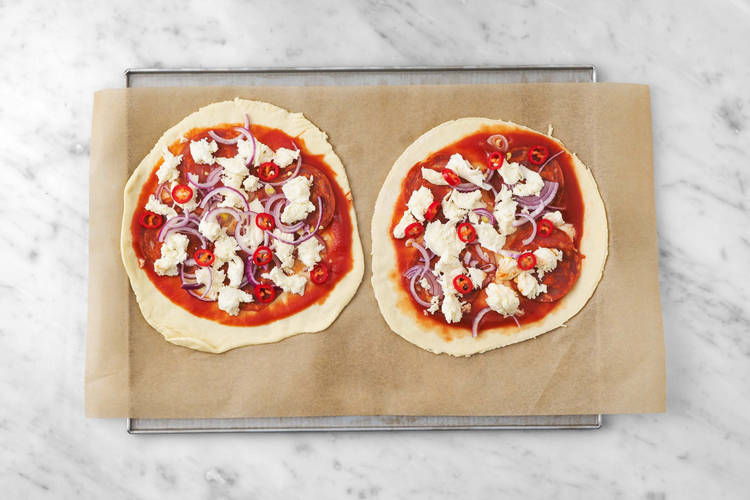 Top the Pizzas