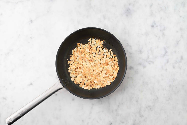 Make sauce and toast almonds