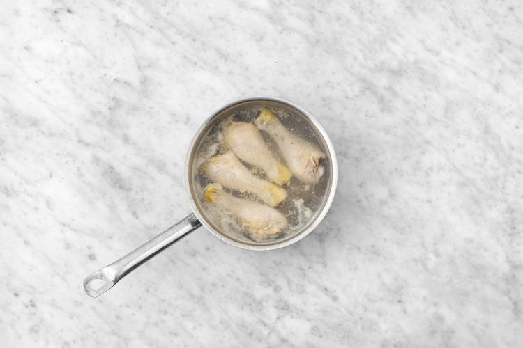 Poach the drumsticks 