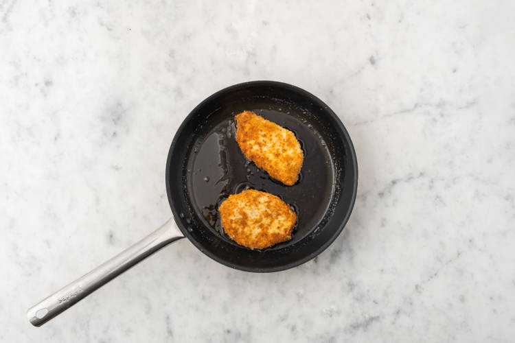 Cook the chicken schnitzels