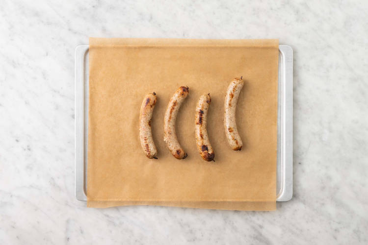 Add the pumpkinBake the sausages