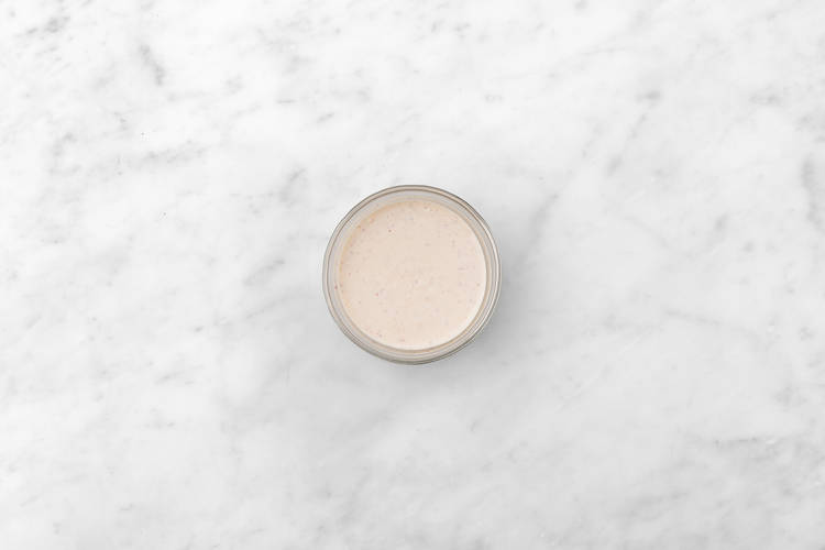 Make the harissa yoghurt