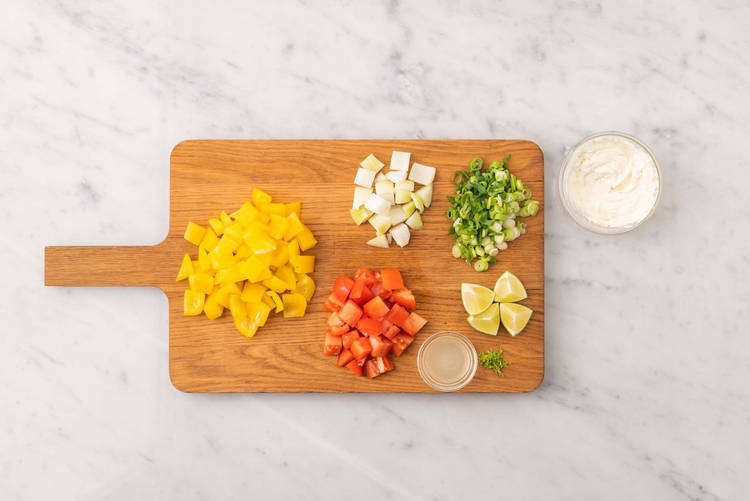 Prep veggies and make lime crema