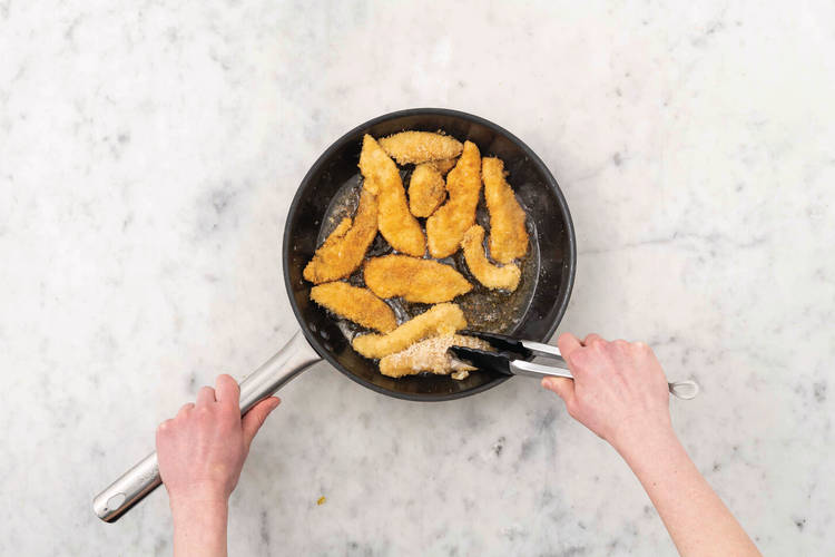 Cook the crumbed chicken