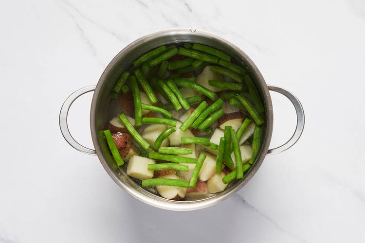 Cook potatoes and beans