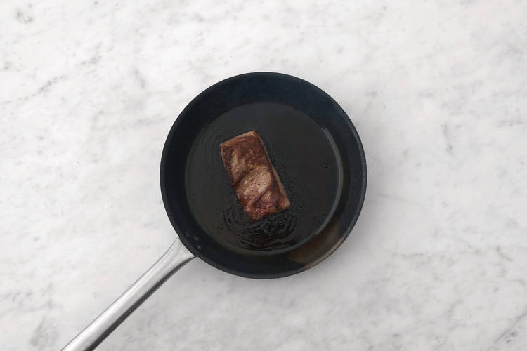 Cook the porterhouse steak