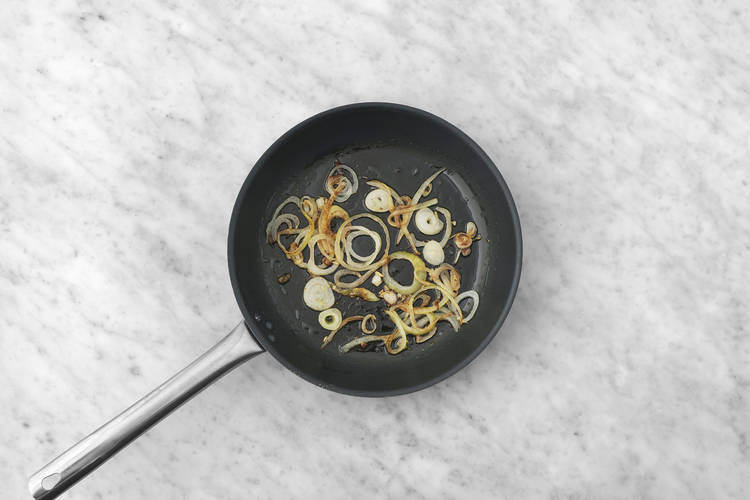 Char the onion & cook the halloumi