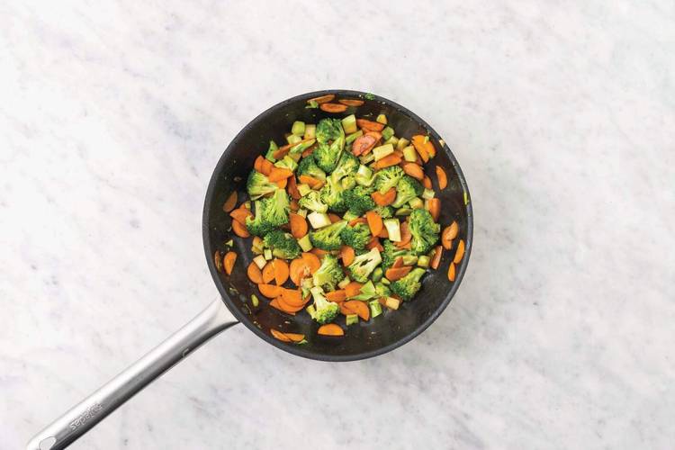 Cook the pork and veggies 