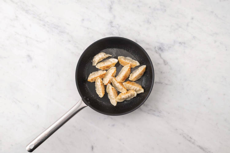 Cook the gyozas