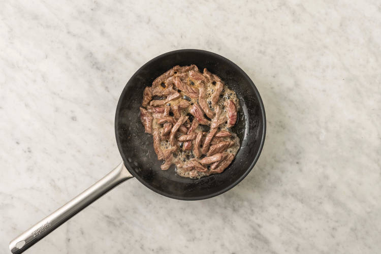 Cook the beef strips