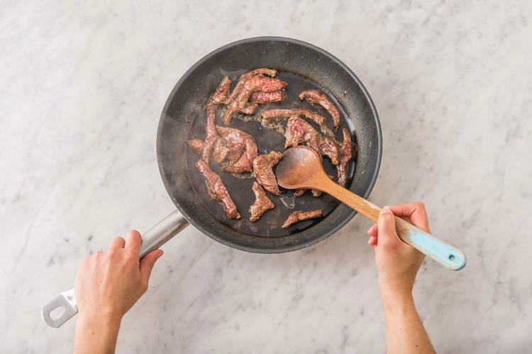 Cook the beef strips