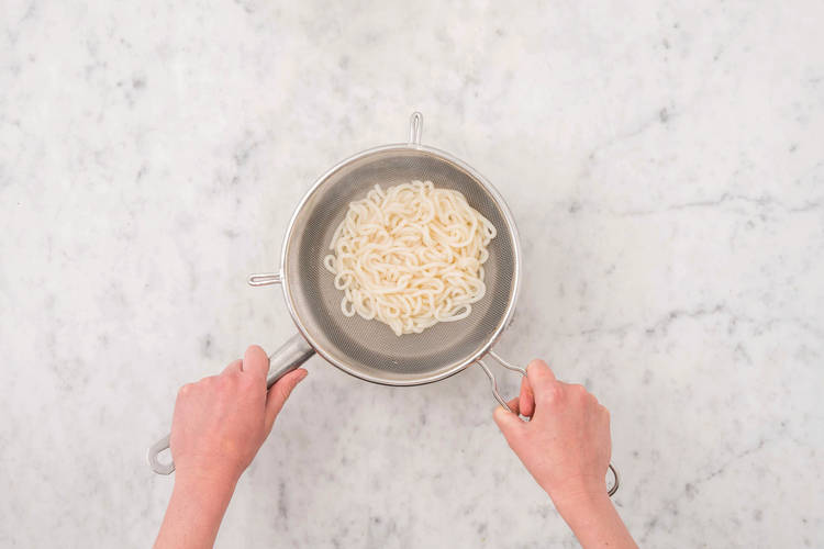 Cook the udon noodles