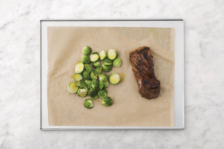 Roast the pork and Brussel sprouts