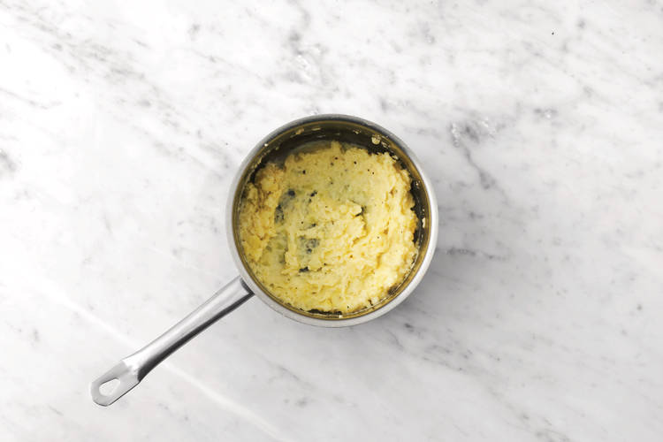 Make the cheesy mash