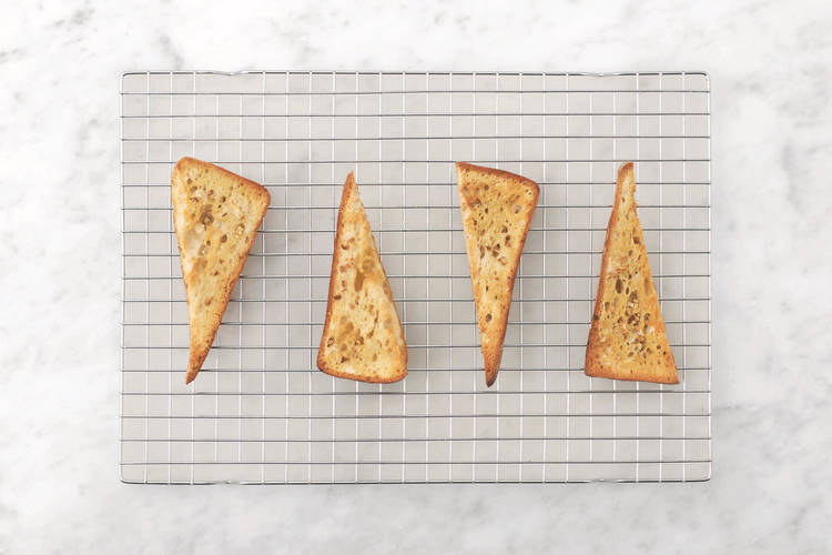 Make garlic bread & toss the salad