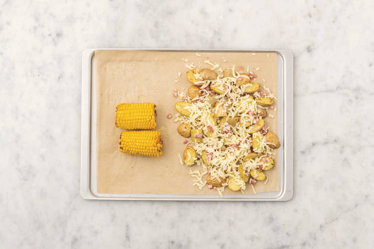 Roast the potatoes & corn