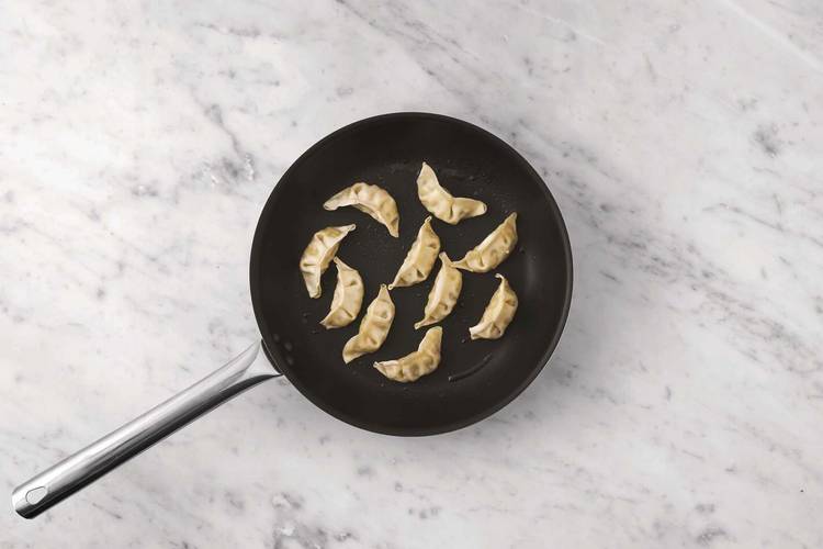 Cook the veggie gyoza