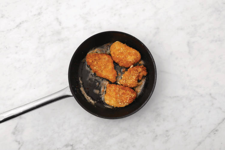 Cook pork schnitzels